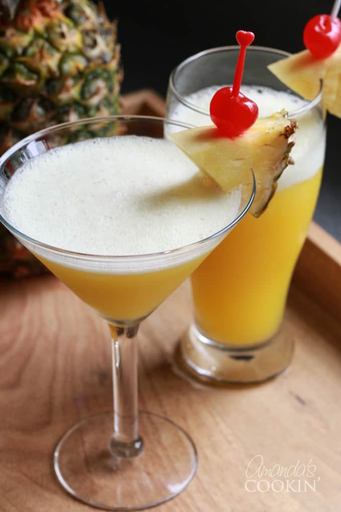 https://amandascookin.com/wp-content/uploads/2018/07/rum-martini-and-cocktail-with-pineapple-V2.jpg