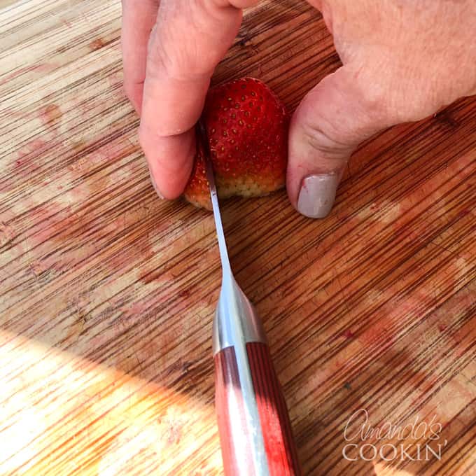 slicing a strawberry
