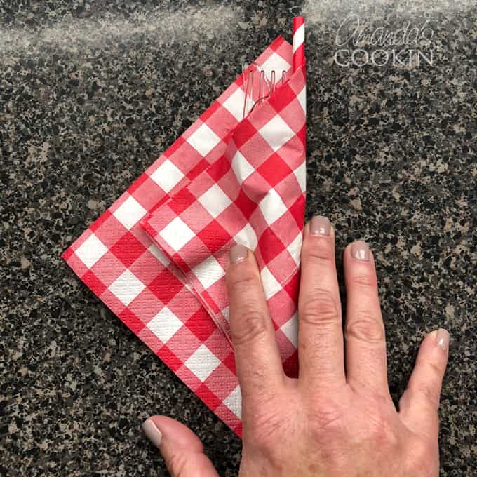 fold napkin over utensils