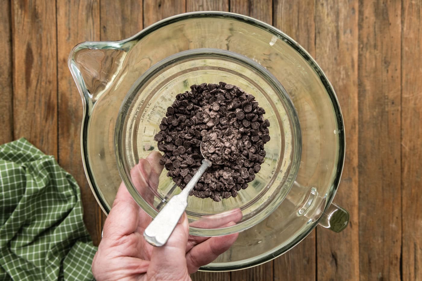 holding a bowl of mini chocolate chips