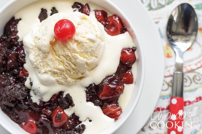 melty ice cream on chocolate cherry cobbler