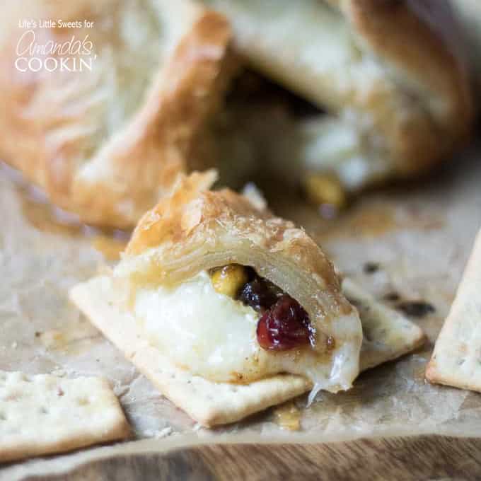 baked brie on a cutting board