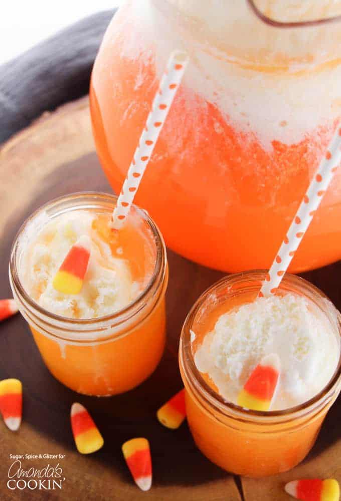 overhead view of two mason jars holding candy corn punch