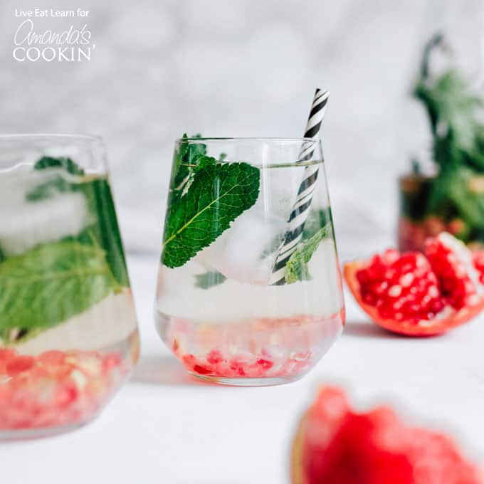 Holiday Detox Drink in wine glasses with straws