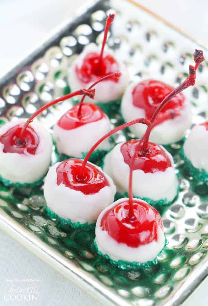 Spiked Cherries with white chocolate coating and green sprinkles