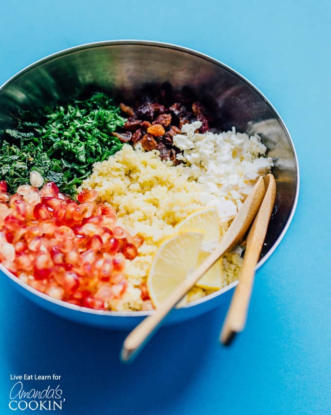 Ingredients for holiday grain salad in a bowl. Mix together