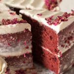 slice of red velvet cake being removed with pie server