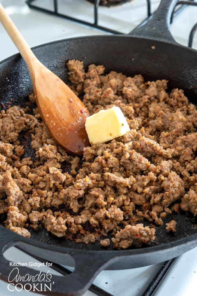 Sausage in skillet with butter