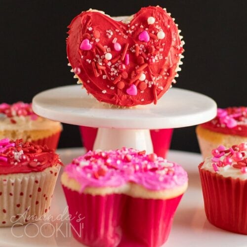 purple coronary heart cupcake standing on its facet  Valentine Coronary heart Cupcakes Valentines Cupcakes RC 500x500