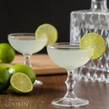 two gimlet cocktails in coupe glasses