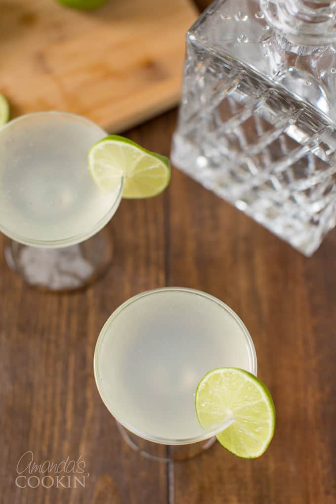 overhead view of two coupe glasses with gin gimlet cocktails