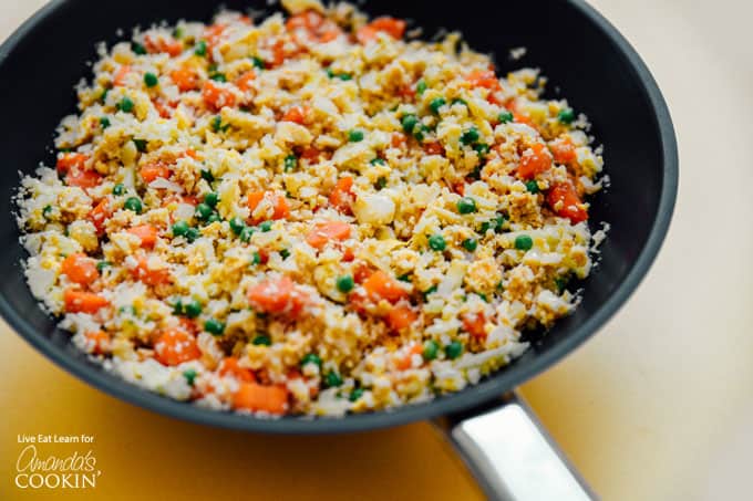 Cauliflower fried rice in wok