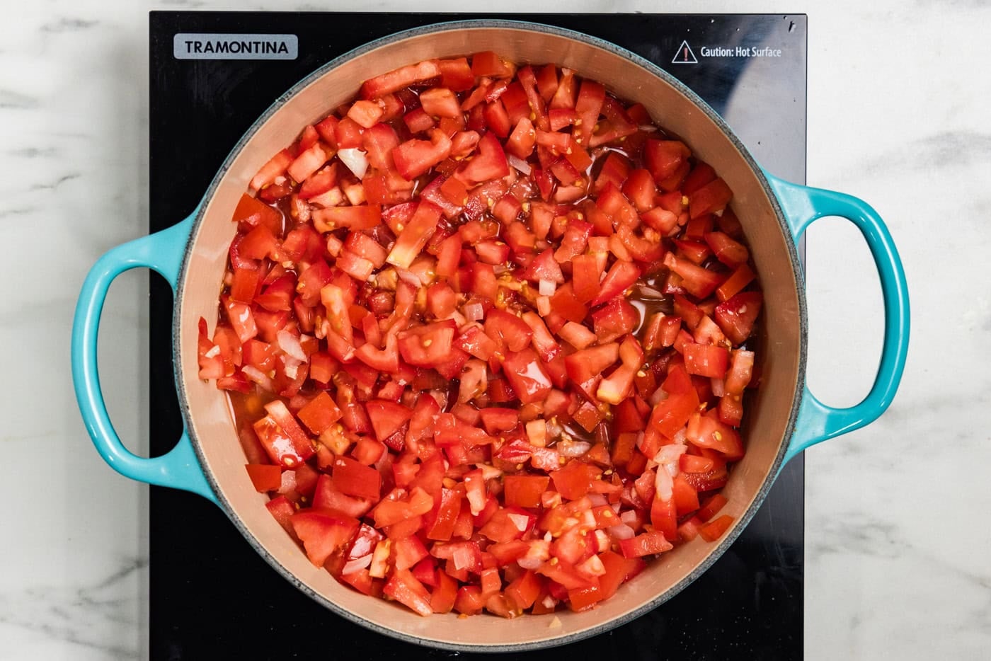 chopped tomatoes in dutch oven