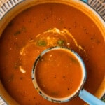 pot of Homemade Tomato Soup with a ladle