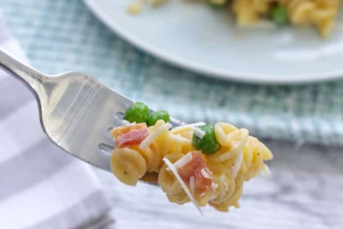 forkful of rotini and peas