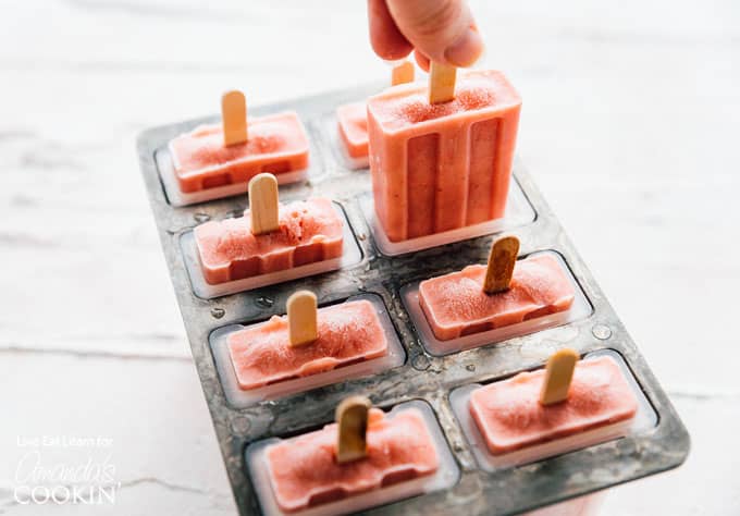 strawberry banana popsicles in popsicle mold