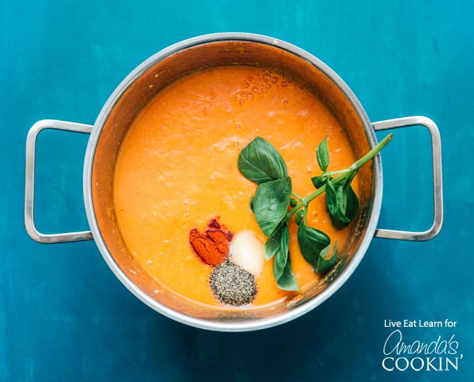 tomato soup in pan with spices