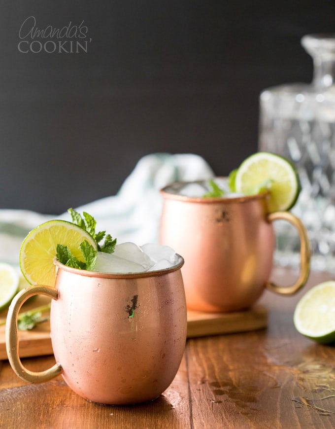 2 copper mugs of moscow mule