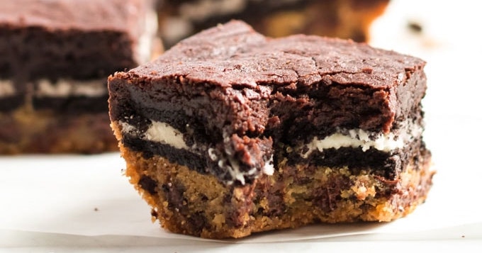 Slutty Brownies - layers of chocolate chip cookie, Oreos, and brownies