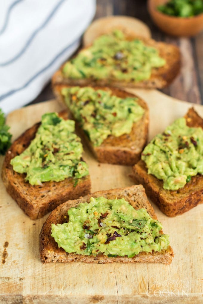 slices of avocado toast on a cutting board