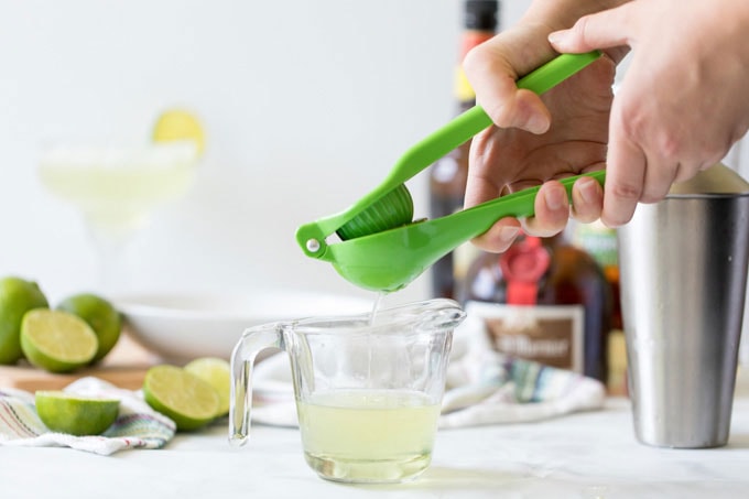 squeezing the juice of a lime