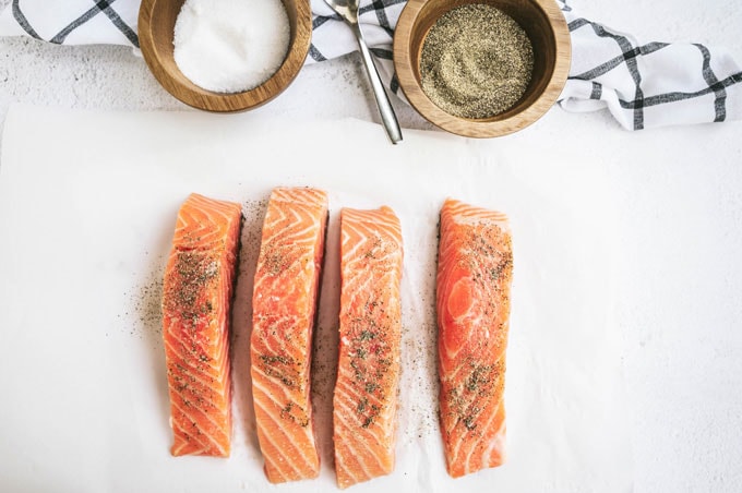 salmon filets seasoned with salt and pepper
