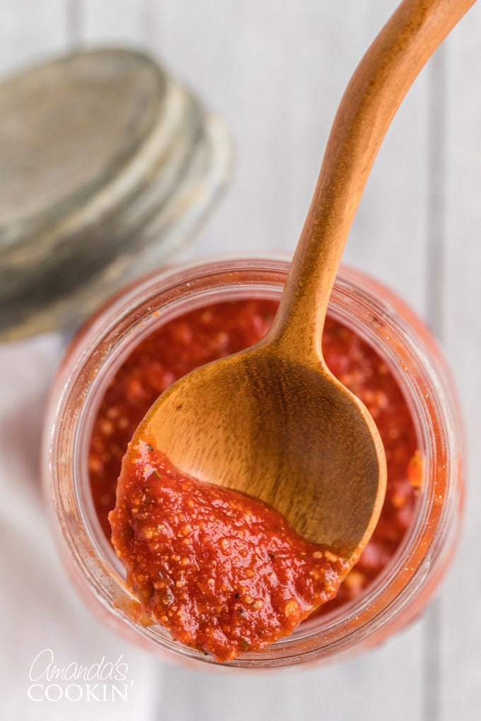 pizza sauce on a spoon
