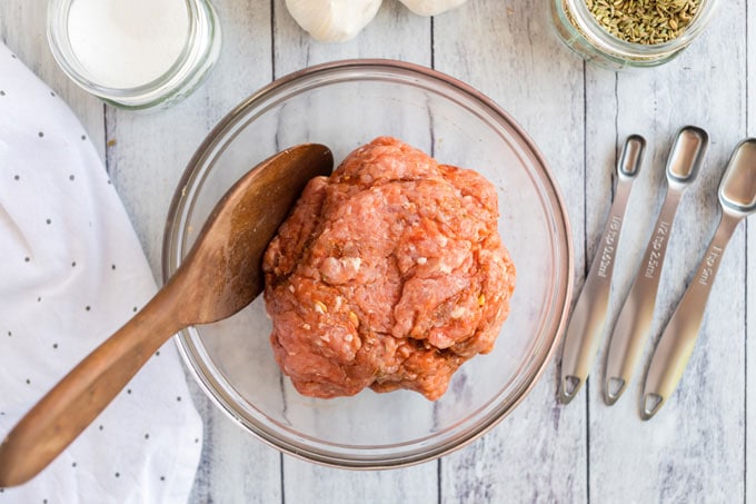 ground pork in bowl with spoon