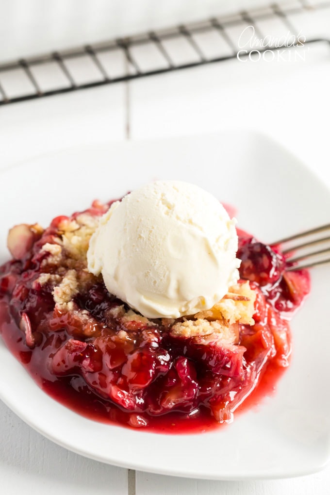 rhubarb crumble with ice cream on a plate