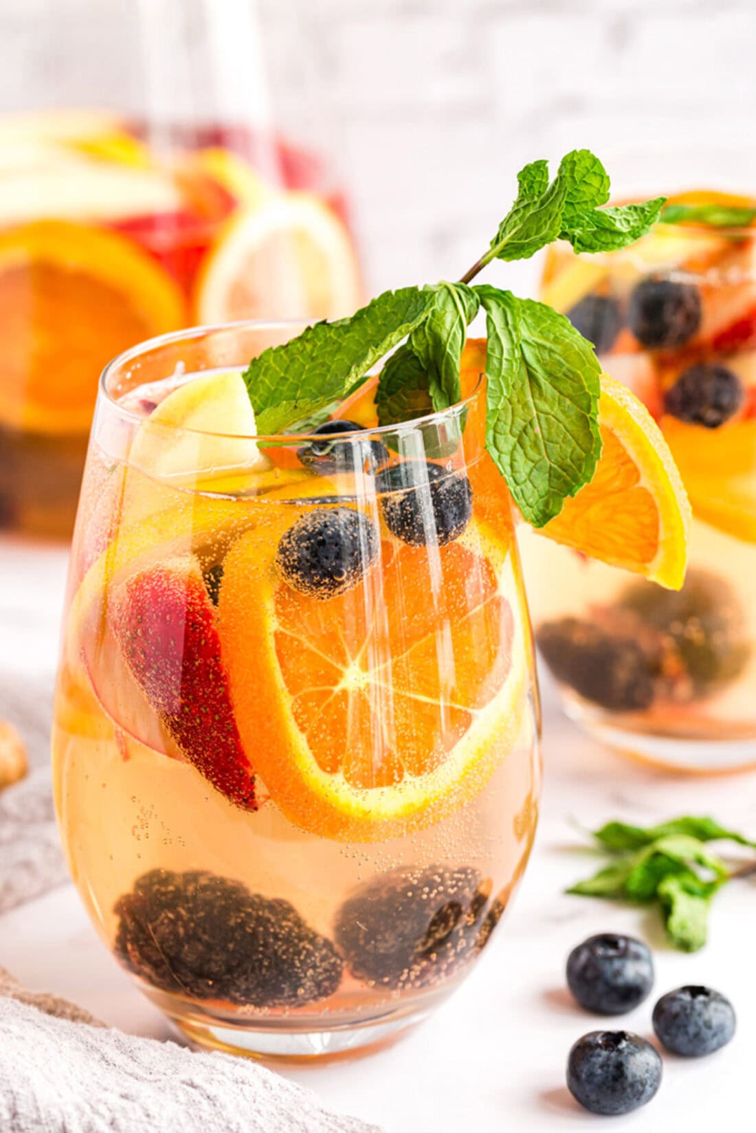 Close up photo of a glass of white moscato sangria