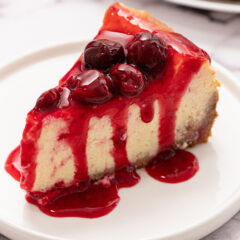 slice of cherry cheesecake on a plate