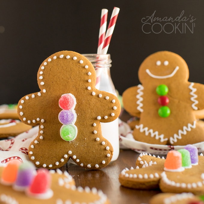 gingerbread man cookie near bottle of milk