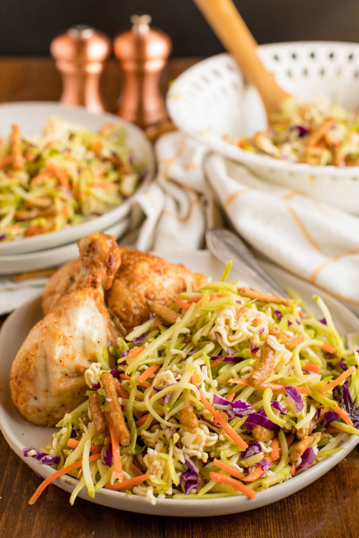 Asian Broccoli Slaw on a plate with chicken