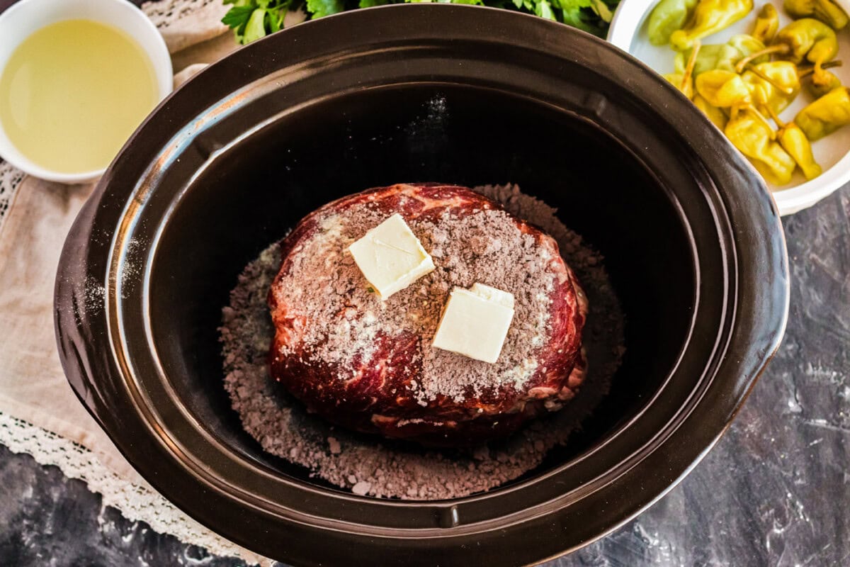 Chuck Roast in crockpot with butter and seasonings