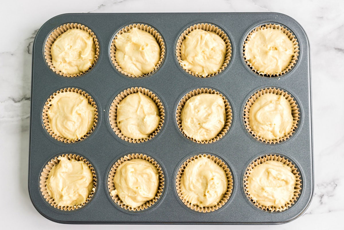 muffin pan filled with cupcake batter