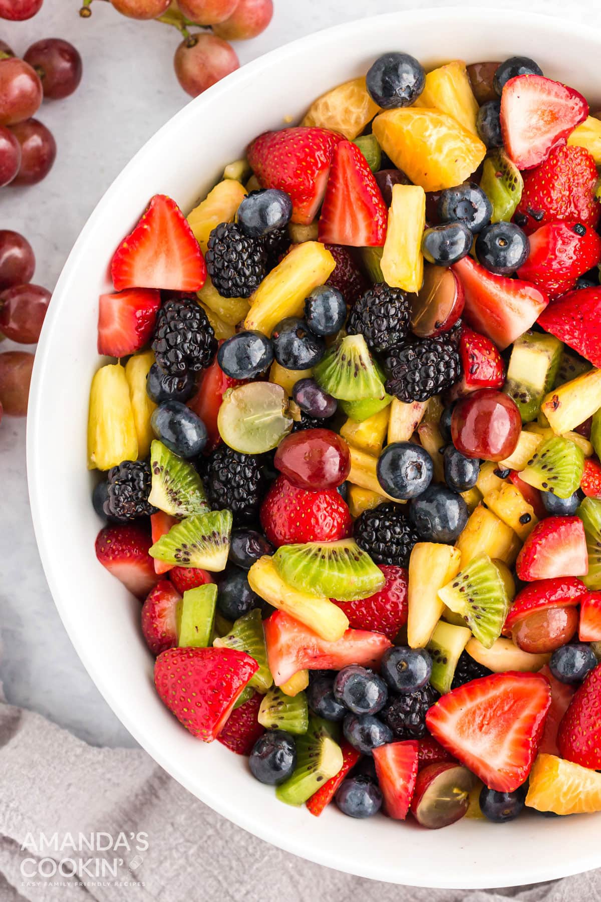 close up of fruit salad in a white bowl