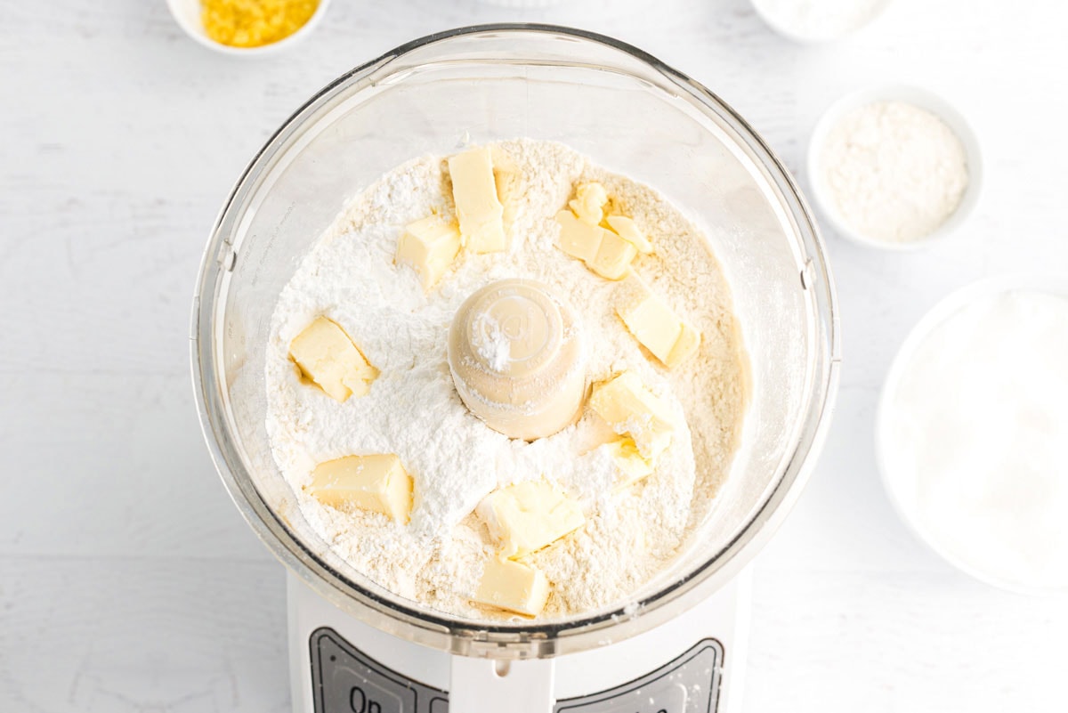 food processor with butter and dry ingredients