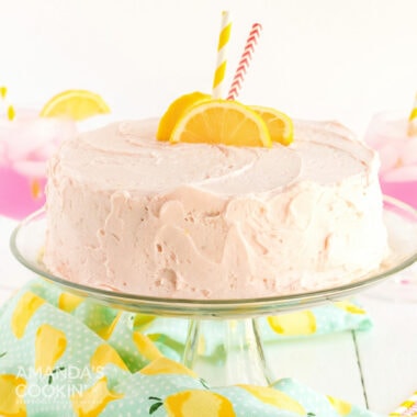 pink lemonade cake on a cake plate