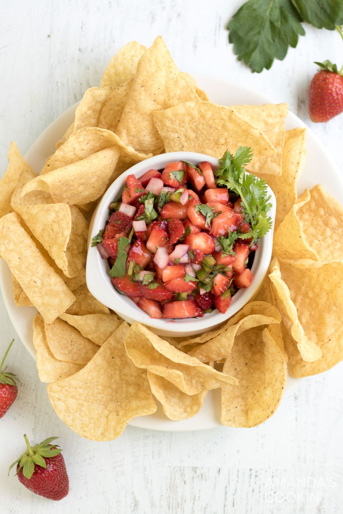 overhead photo of strawberry salsa and chips