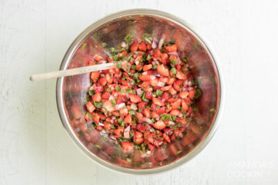 strawberry salsa in a large silver bowl