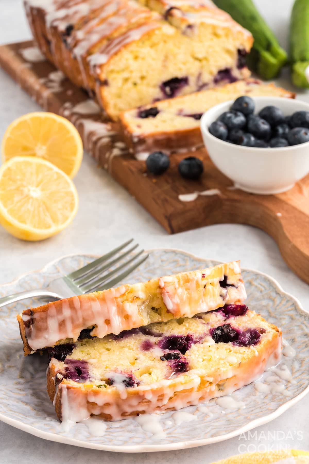 two slices of lemon zucchini bread on a plate