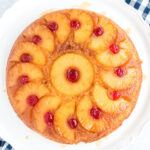 pineapple upside down cake on a white plate