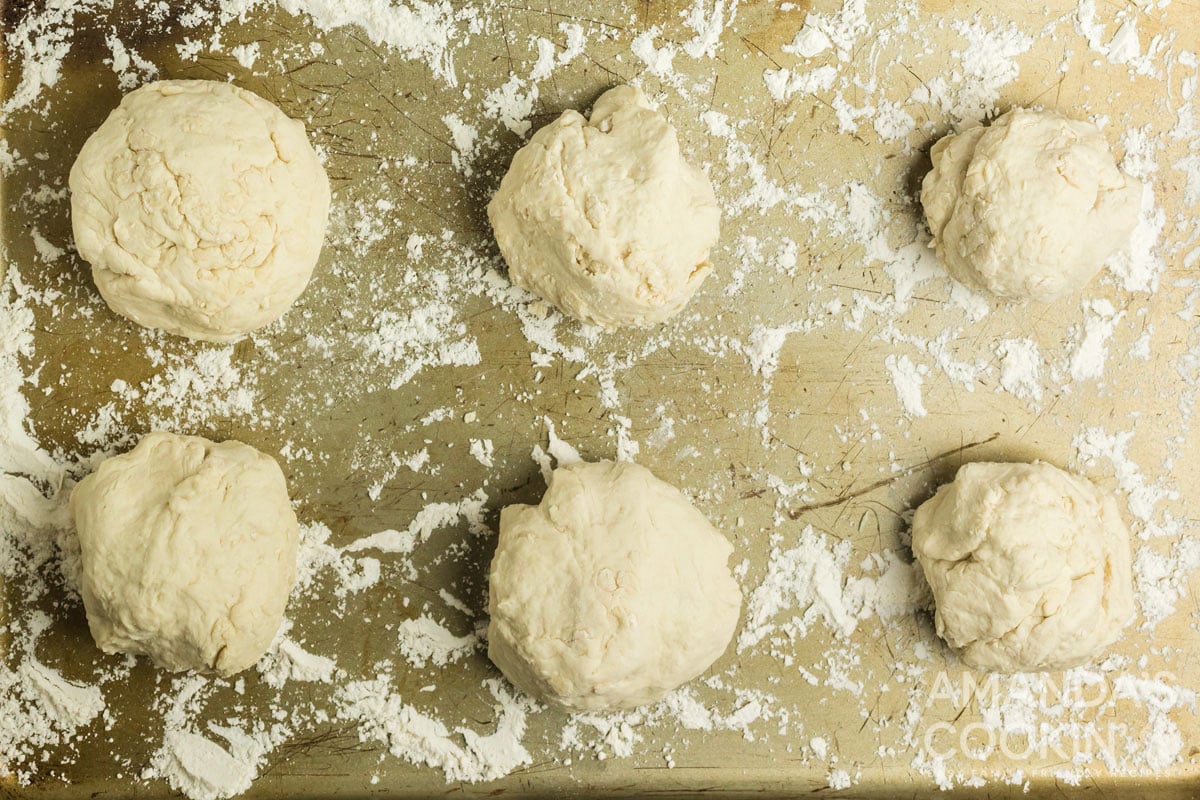 6 balls of dough on cookie sheet