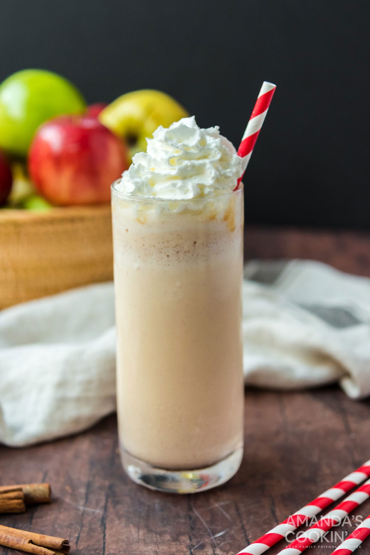 apple cider milkshake in a tall glass