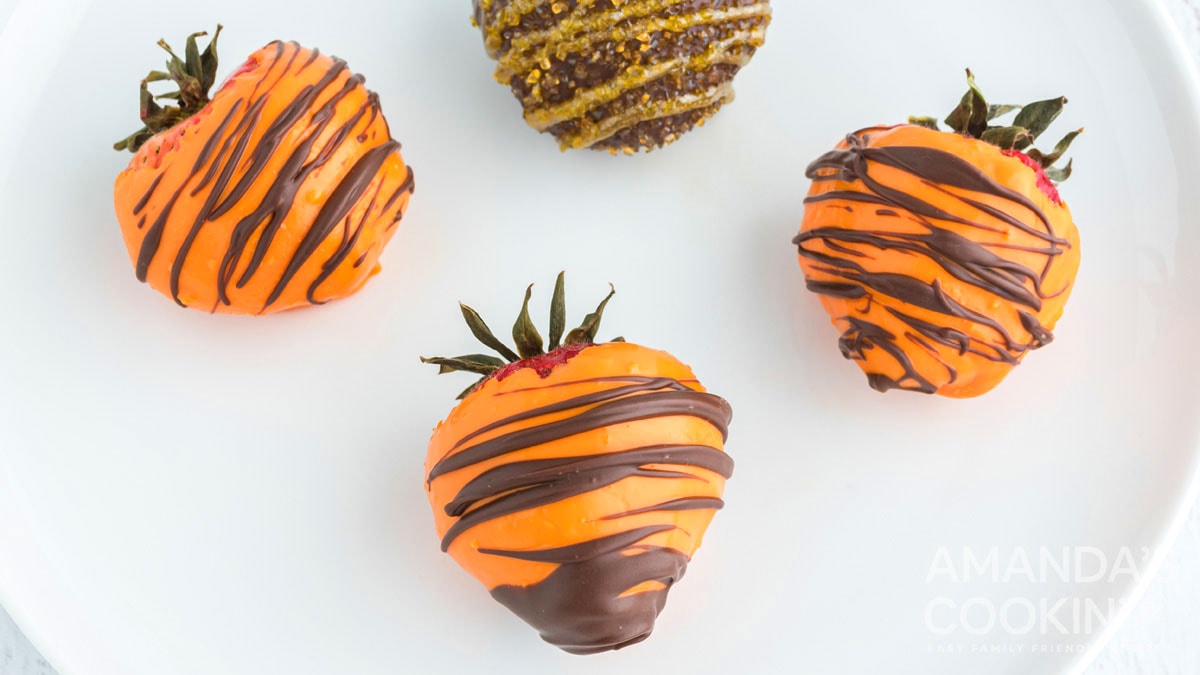 orange and brown chocolate covered strawberries for fall
