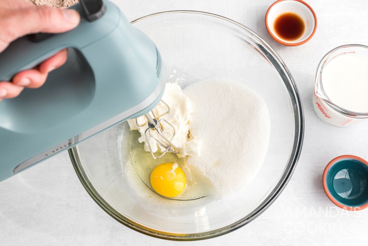 mixing egg with sugar and shortening