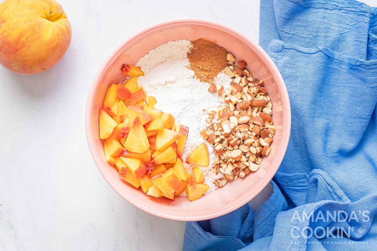 peach bread ingredients in a bowl