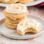 frosted eggnog cookies on a plate