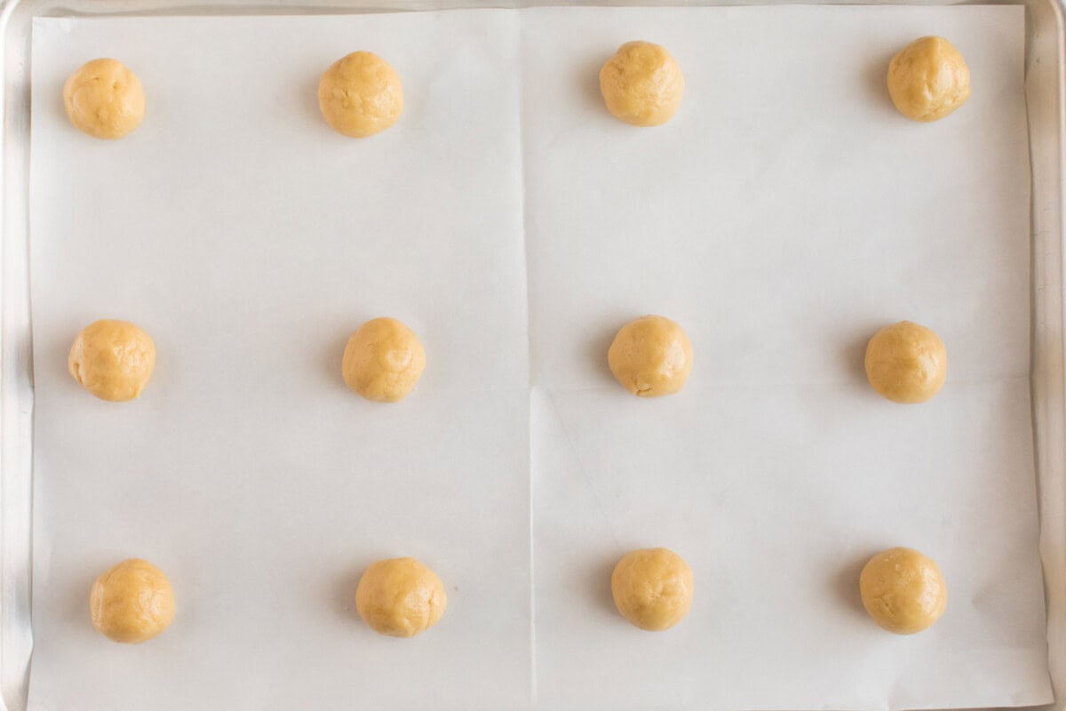 dough balls on baking sheet