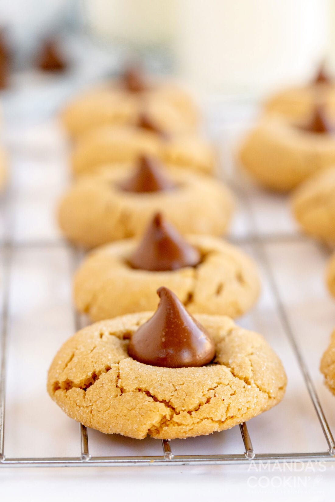 peanut butter blossom cookies on wire rack